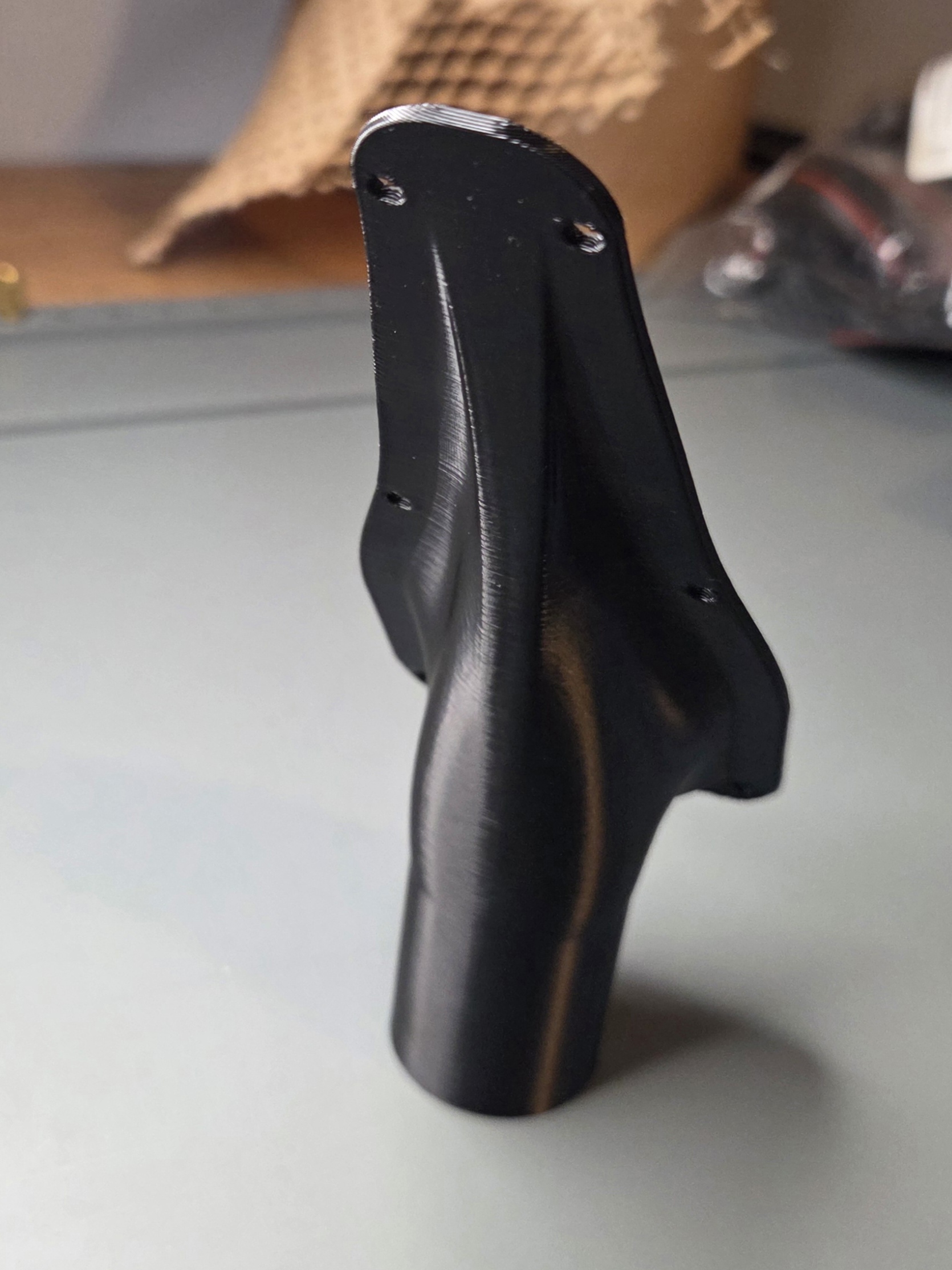 Custom asymmetric air duct profile view showing sweeping geometry and mounting flange